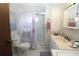 Cozy bathroom features a shower, vanity and storage space at 6843 Amoko Ct, North Port, FL 34287