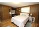 Bedroom with a bed, dresser, and window for natural light at 6843 Amoko Ct, North Port, FL 34287