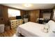 Bedroom with a bed, dresser, and window for natural light at 6843 Amoko Ct, North Port, FL 34287