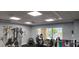 Community gym featuring a variety of exercise equipment and plenty of natural light at 6843 Amoko Ct, North Port, FL 34287