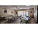 Spacious meeting room featuring multiple tables and seating, ideal for community gatherings and events at 6843 Amoko Ct, North Port, FL 34287