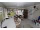 Cozy sunroom features comfortable seating and ample natural light at 6843 Amoko Ct, North Port, FL 34287