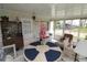 Bright sunroom with tile floors offers versatile space for relaxation and entertainment at 6843 Amoko Ct, North Port, FL 34287