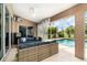 Relaxing outdoor space featuring a large patio area with stylish furniture and a refreshing swimming pool at 7101 Dogwood Ct, North Port, FL 34287