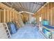 Spacious barn interior with high ceilings, exposed framing, and concrete floors, ideal for storage and projects at 7274 Alan Blvd, Punta Gorda, FL 33982