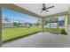 Screened patio overlooking the lawn and backyard at 8667 Lisa Blvd, North Port, FL 34288