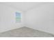 Empty bedroom with neutral colors and plenty of natural light at 8700 Seasalt Loop, Englewood, FL 34224