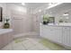 This bathroom has a large tub and a separate tiled shower at 99 Vivante Blvd # 303, Punta Gorda, FL 33950