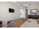 Primary bedroom features a TV and dresser at 99 Vivante Blvd # 303, Punta Gorda, FL 33950