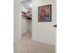 Walk-in closet features built-in shelving at 99 Vivante Blvd # 303, Punta Gorda, FL 33950