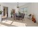 Bright dining room features tiled floors and lots of natural light at 99 Vivante Blvd # 303, Punta Gorda, FL 33950