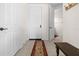 Clean entryway with tile flooring, coat hooks, and a view into the hallway, creating a welcoming entrance at 99 Vivante Blvd # 303, Punta Gorda, FL 33950