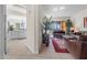 Open living room with tile floors, modern decor, and sliding glass doors to the outdoor space at 99 Vivante Blvd # 303, Punta Gorda, FL 33950