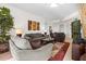 Inviting living room with plush sofas, modern art, and an open layout, perfect for gatherings at 99 Vivante Blvd # 303, Punta Gorda, FL 33950