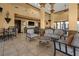 Comfortable lounge area with cozy seating and modern bar with TVs, perfect for gatherings and relaxation at 99 Vivante Blvd # 303, Punta Gorda, FL 33950