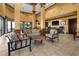 Inviting lounge with comfortable seating, a bar, and TVs creating a relaxed atmosphere for residents to enjoy at 99 Vivante Blvd # 303, Punta Gorda, FL 33950