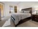 This main bedroom offers lots of natural light and is carpeted at 99 Vivante Blvd # 303, Punta Gorda, FL 33950