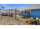Backyard area offering an above-ground pool, covered patio, and plenty of space for outdoor entertaining at 10229 Gulfstream Blvd, Englewood, FL 34224