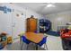 Functional room features a bunk bed, a play table and a chest of drawers for storage needs at 10229 Gulfstream Blvd, Englewood, FL 34224