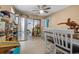 Bright dining area with stainless steel refrigerator, table and chairs offering an inviting space at 10229 Gulfstream Blvd, Englewood, FL 34224