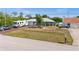 Well-maintained home with lush landscaping and ample parking at 10229 Gulfstream Blvd, Englewood, FL 34224