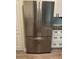 Stainless steel refrigerator with French door and freezer, offering a blend of style and functionality at 11422 2Nd Ave, Punta Gorda, FL 33955