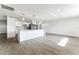 Unstaged open-concept kitchen area featuring modern decor, sleek furniture, and stylish accents at 1231 Beacon Dr, Port Charlotte, FL 33952