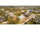 A charming single-Gathering home nestled amongst mature trees in a quiet residential area at 13204 Kakapo Ave, Port Charlotte, FL 33981