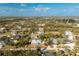 Spacious single-Gathering home in a lush, green neighborhood with mature trees and a picturesque landscape at 13204 Kakapo Ave, Port Charlotte, FL 33981