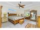 Spacious bedroom with tray ceilings, a tropical style bed set, and lots of natural light at 13204 Kakapo Ave, Port Charlotte, FL 33981