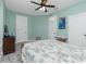 Bright bedroom with two closets, ceiling fan and decor at 13204 Kakapo Ave, Port Charlotte, FL 33981
