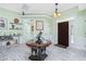 Welcoming foyer featuring a decorative table and a view into the main living areas at 13204 Kakapo Ave, Port Charlotte, FL 33981