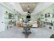 Spacious living room with stylish decor, a coffered ceiling, and an open floor plan at 13204 Kakapo Ave, Port Charlotte, FL 33981