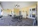 Charming outdoor patio area with brick pavers, a dining set, and an inviting atmosphere at 13204 Kakapo Ave, Port Charlotte, FL 33981