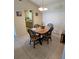 Bright dining area with table and chairs, adjacent to kitchen at 13366 Ballon Ave, Port Charlotte, FL 33981
