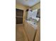 Functional laundry room featuring a washer, dryer, and storage cabinet at 13366 Ballon Ave, Port Charlotte, FL 33981