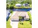 Beautiful waterfront home with lush landscaping and a private dock, offering serene water views at 13830 Begonia Cir, Port Charlotte, FL 33981