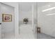 Bathroom featuring jacuzzi style tub and glass shower enclosure at 1425 Park Beach Cir # 1310, Punta Gorda, FL 33950