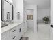 Bathroom featuring marble countertops, tub, and tiled floors at 1425 Park Beach Cir # 1310, Punta Gorda, FL 33950