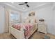 Inviting bedroom with a comfortable bed, neutral decor, and a bright window at 1425 Park Beach Cir # 1310, Punta Gorda, FL 33950