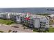 Modern condo building with private balconies overlooking scenic waterfront at 1425 Park Beach Cir # 1310, Punta Gorda, FL 33950