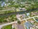 Aerial view of waterfront homes with canals and docks for boating and enjoying the water at 15104 Aldama Cir, Port Charlotte, FL 33981