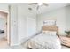Inviting bedroom with a comfortable bed, closet, and stylish decor, perfect for relaxation and restful nights at 17557 Santorini Ct, Venice, FL 34293