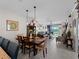 Open concept dining area seamlessly flows to the living room, creating an inviting and spacious atmosphere at 17857 Woodland Ct, Punta Gorda, FL 33982