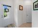 Welcoming entryway with natural light from the front door window at 17857 Woodland Ct, Punta Gorda, FL 33982