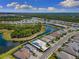 Beautiful aerial view of home with lake view at 19821 Montenero Way, Venice, FL 34293