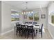 Bright dining room featuring stylish decor, ample natural light, and a welcoming atmosphere for meals at 19821 Montenero Way, Venice, FL 34293