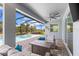 Relaxing screened-in pool area with comfortable seating and a beautiful view at 19821 Montenero Way, Venice, FL 34293