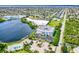 Beautiful aerial view of a coastal community with a lake, pool, and well-manicured landscaping at 2001 Bal Harbor Blvd # 2306, Punta Gorda, FL 33950