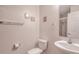 Clean bathroom features toilet, sink, mirror, towel rack, and tiled shower at 2001 Bal Harbor Blvd # 2306, Punta Gorda, FL 33950